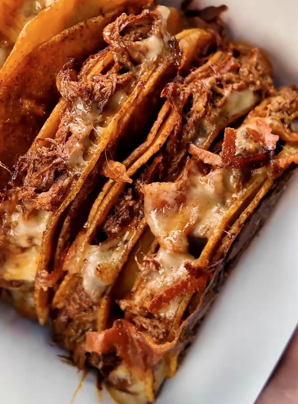 Birria quesatacos with melted cheese and crisp edges